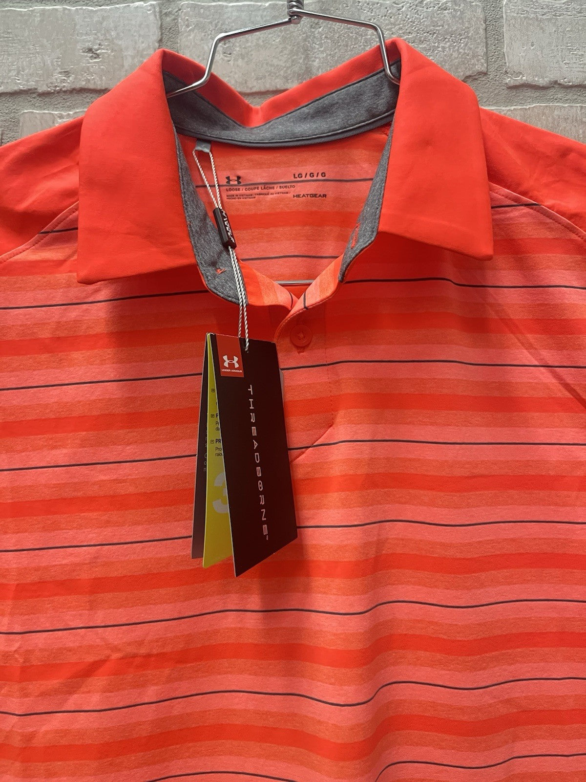 Under Armour men’s polo golf shirt Sz L heated gear orange stripe sportswear NWT