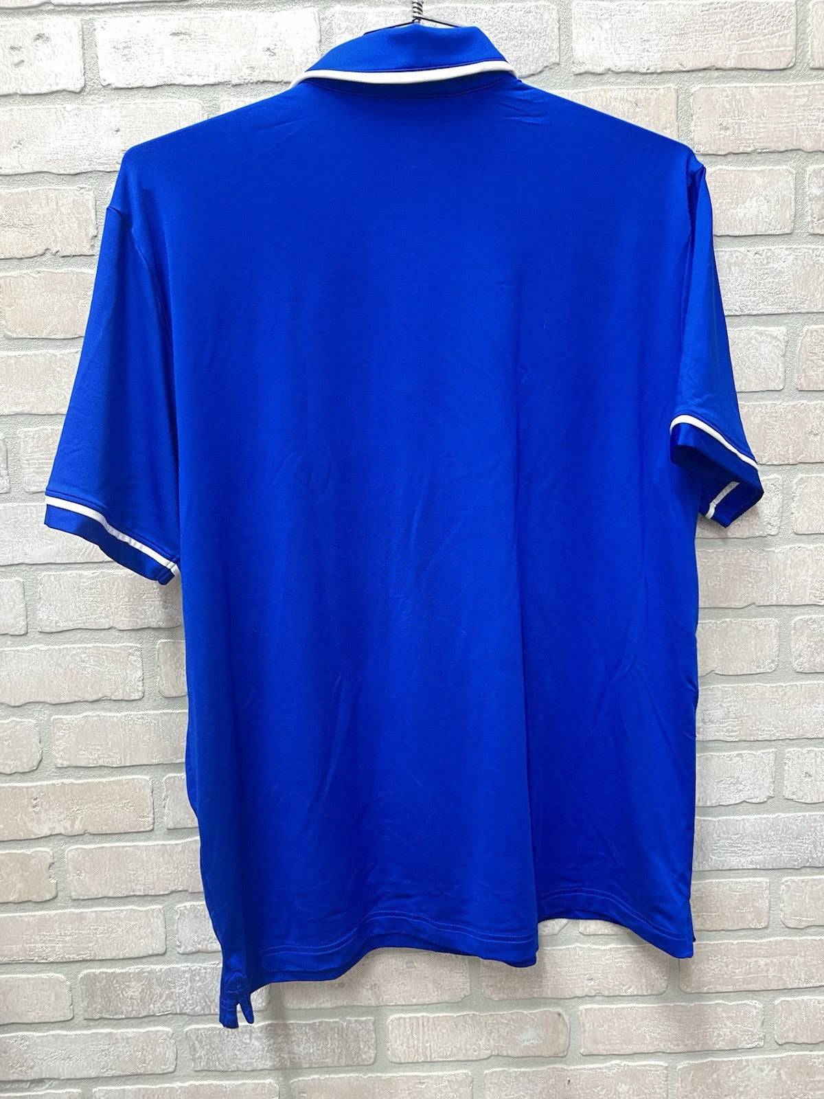 Under Armour men’s polo golf shirt Sz XL loose Blue logo activewear NWT