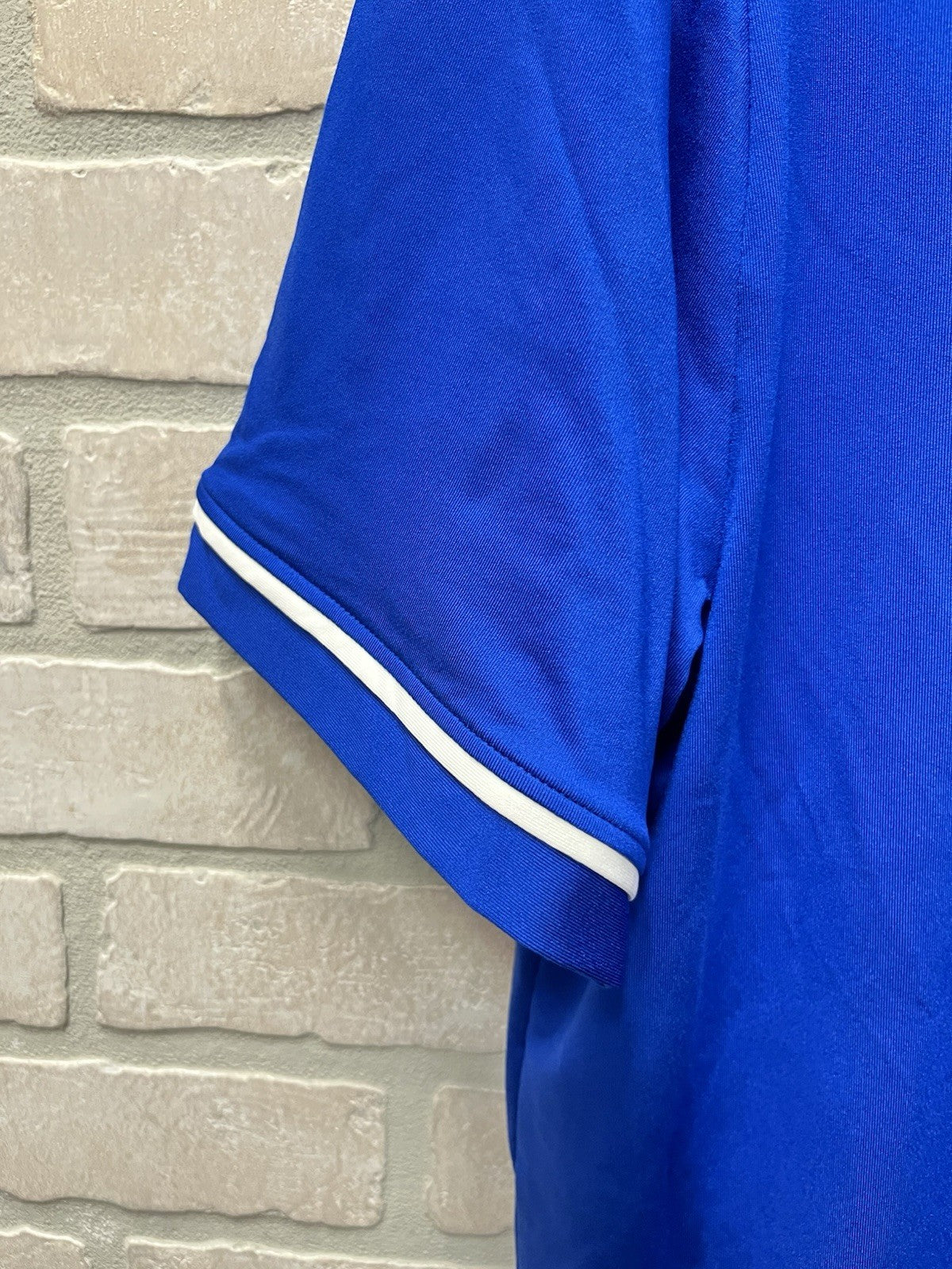 Under Armour men’s polo golf shirt Sz XL loose Blue logo activewear NWT