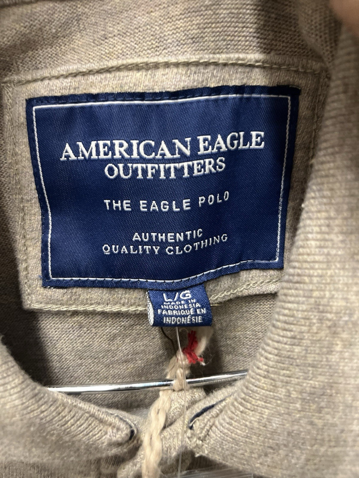 American Eagle men’s long sleeve pullover rugby style Sz L brown stripe NWT