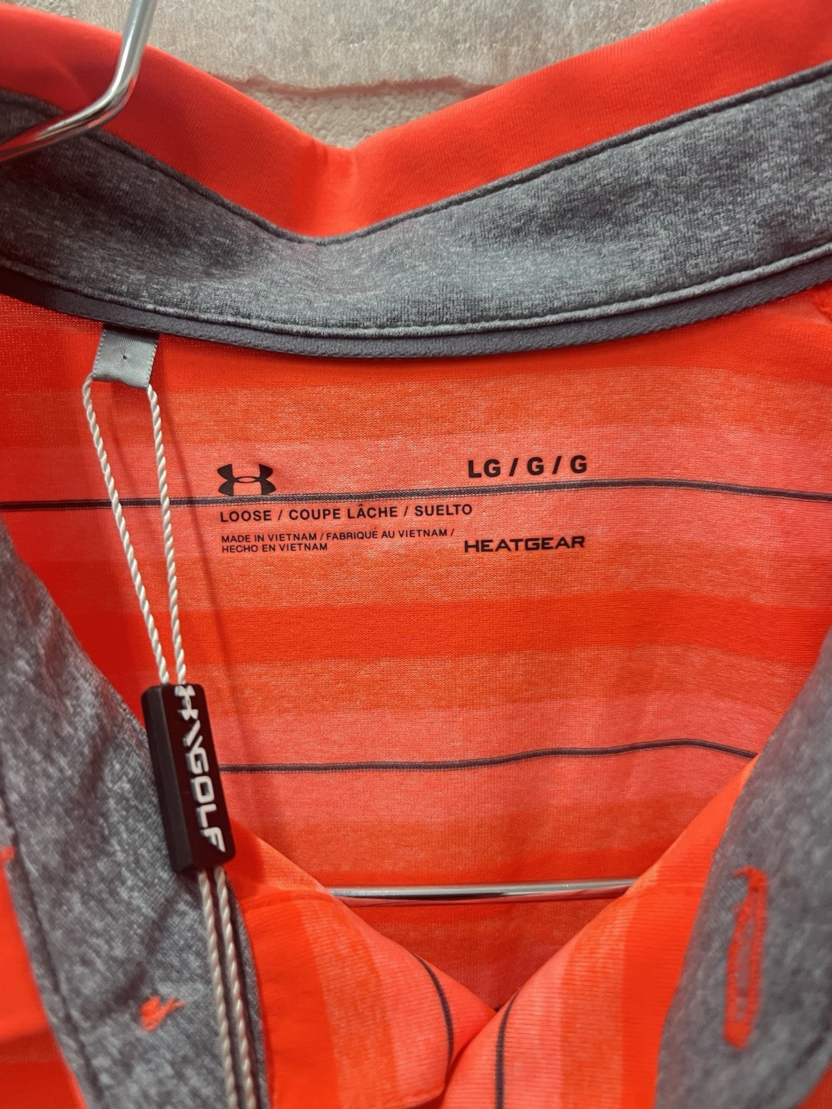 Under Armour men’s polo golf shirt Sz L heated gear orange stripe sportswear NWT